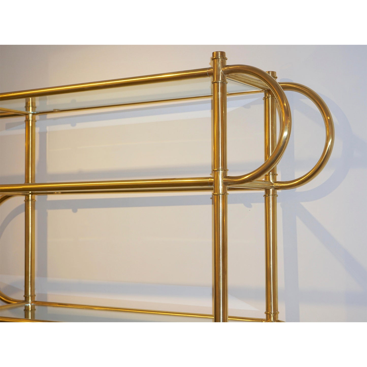 Italian Modern Gold Brass Tubular Shelving Unit Étagère on Black Lacquered Base